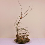 VII-Winding-willow-on-the-outside-of-glasscontainer-as-support